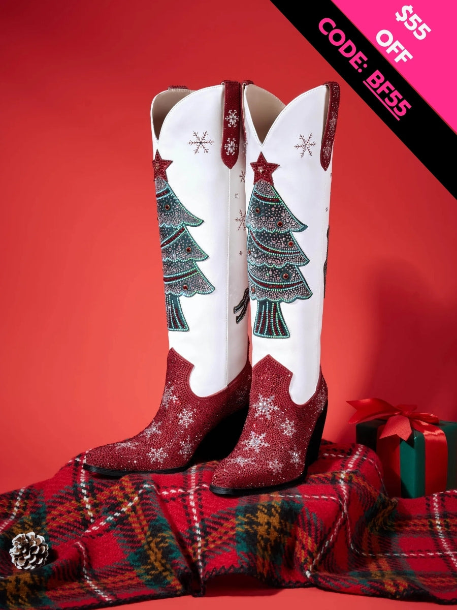 Decorative cowboy boots with Christmas tree design on a red background with a gift box.