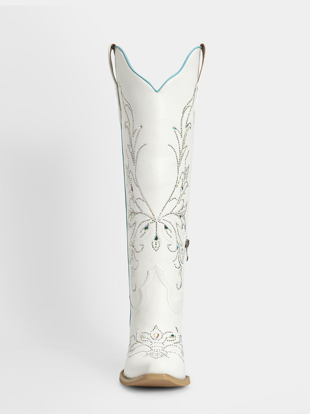 A single white cowboy boot with silver embroidered floral patterns, a light blue inner collar lining, and a tan sole, shown against a plain light gray background.