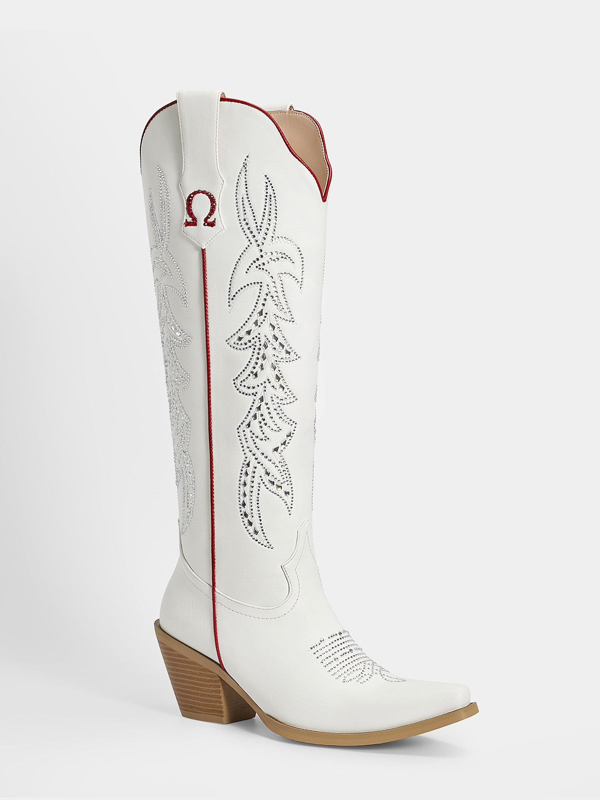 A white leather cowboy boot with silver rhinestone embroidery, a red pull tab, and a brown stacked block heel, shown against a light gray background.
