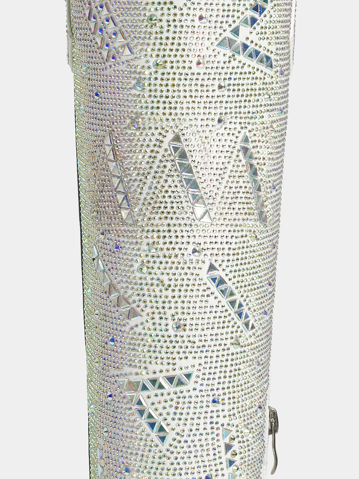 A close-up of a silver rhinestone-covered cylindrical product, likely a boot shaft or decorative column, featuring geometric mirrored crystal patterns on a light gray background.