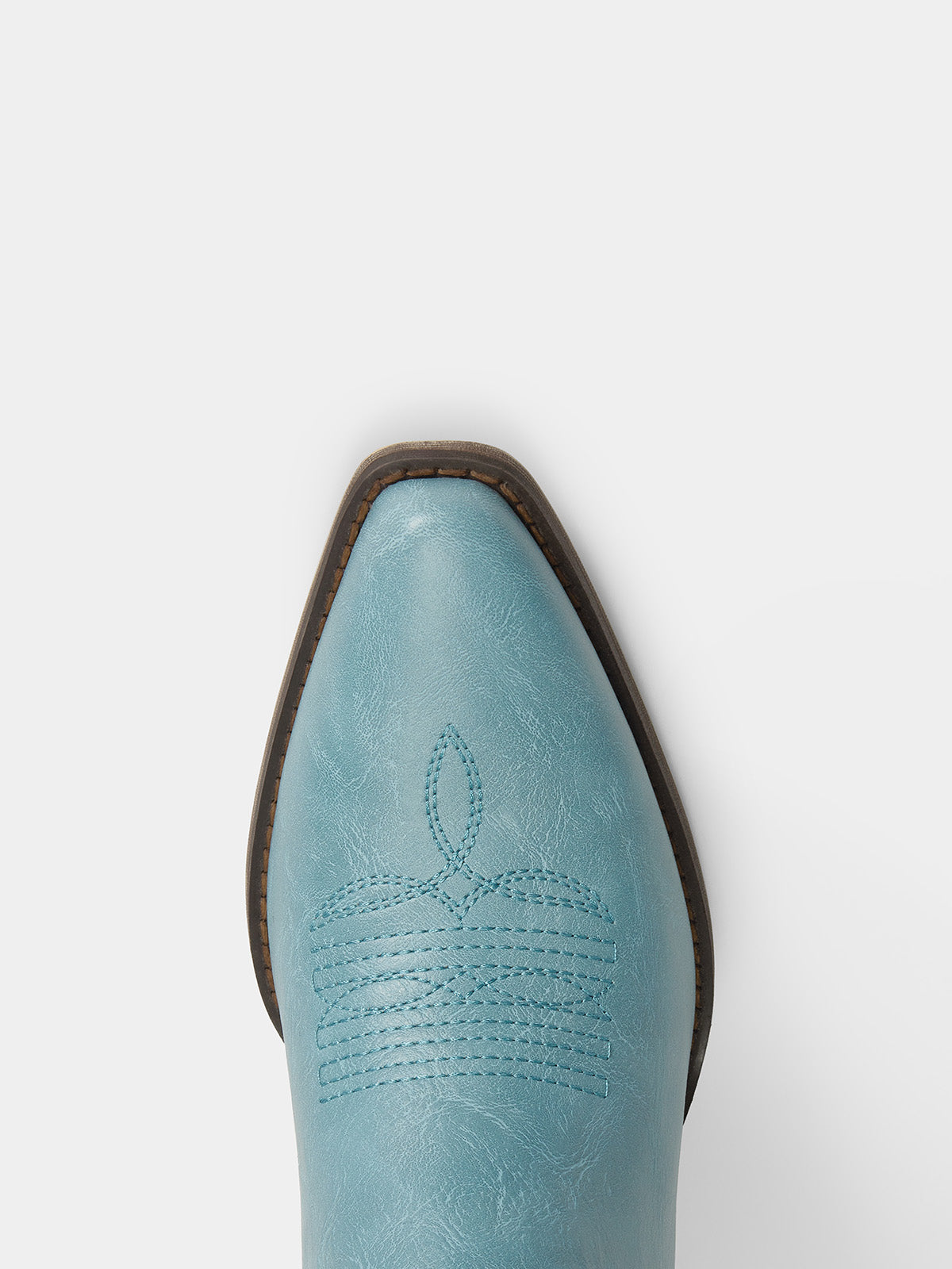 muted-blue-cutout-star-pattern-cowgirl-boots-pointy