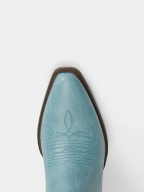 muted-blue-cutout-star-pattern-cowgirl-boots-pointy